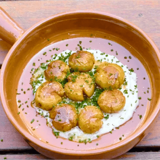 Smashed Potatoes with Garlic Confit Creme Fraiche Recipe