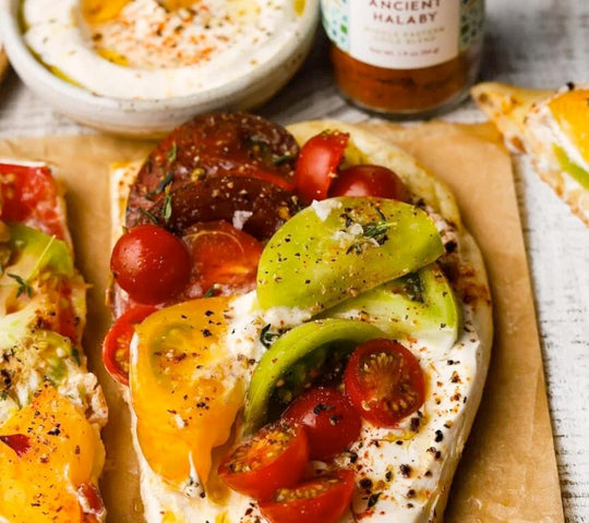 Sumac Tomato Flatbread with Garlic Yogurt Spread Recipe